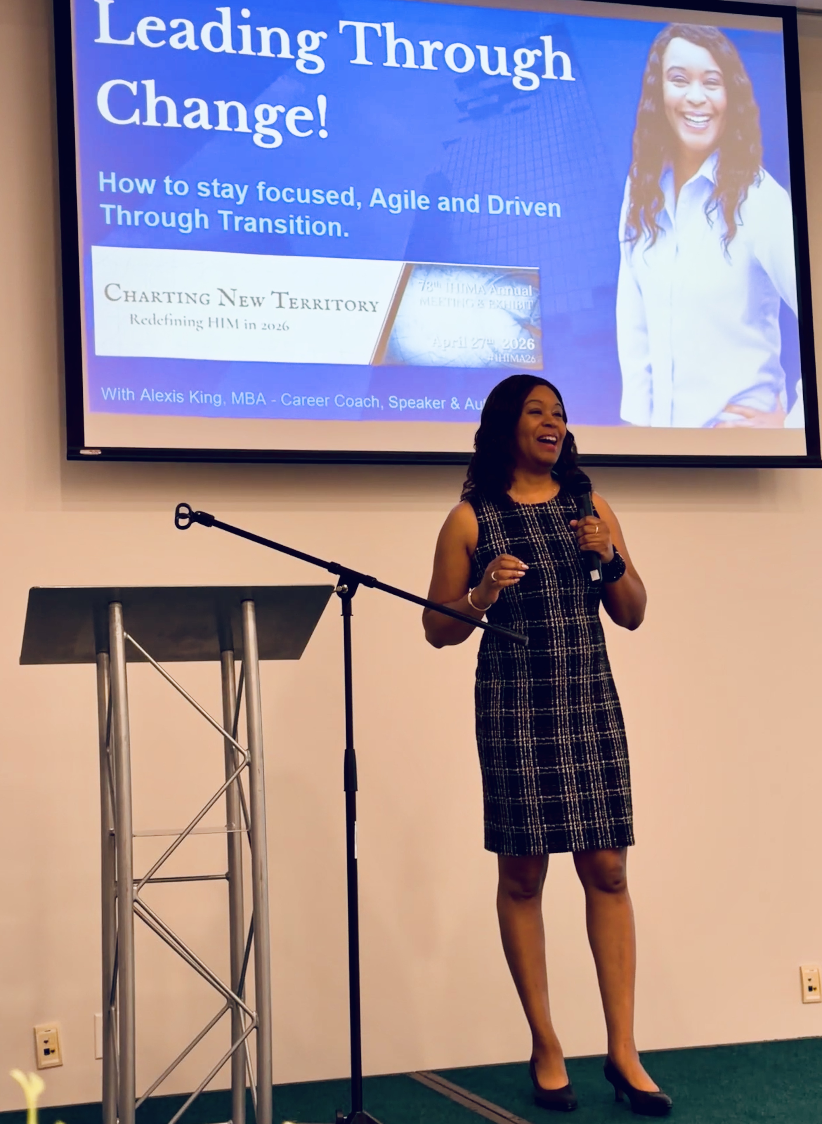 Alexis King speaking on stage